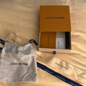 Louis Vuitton box and bag (small dent see pics)